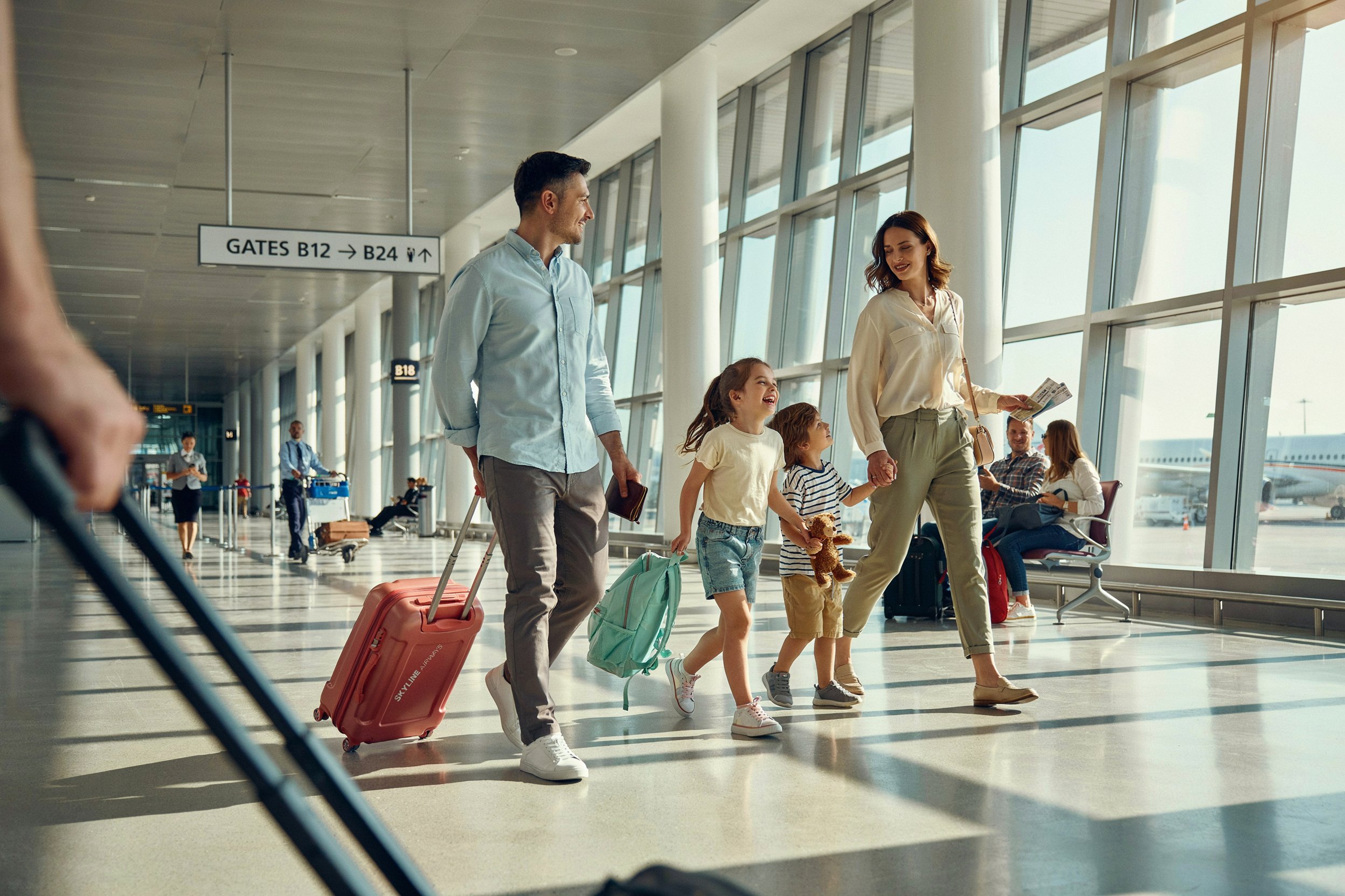 A traveler moving through an airport